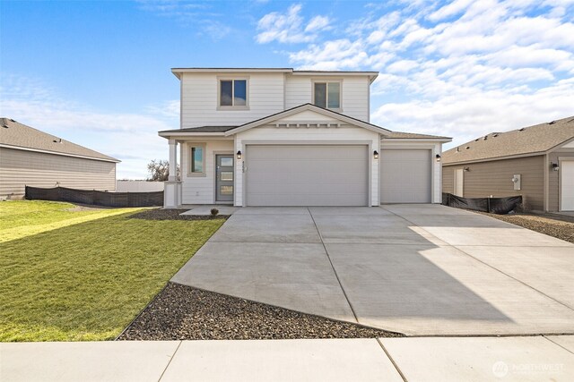 4223 W Sandy Ct, Moses Lake, WA 98837 - view of front of property featuring concrete driveway and a garage