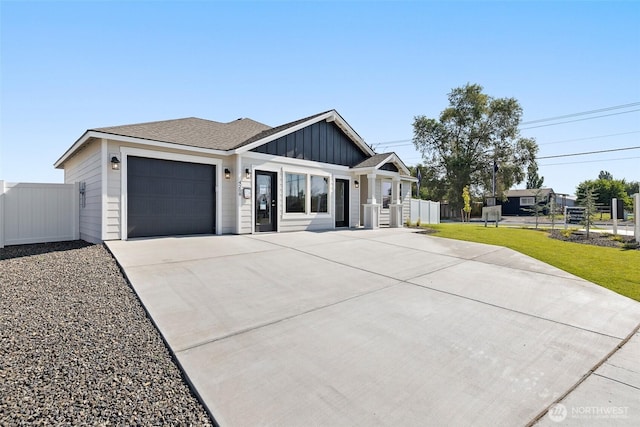 4208 W Sandy Ct, Moses Lake, WA 98837 - modern inspired farmhouse with board and batten siding, driveway, and an attached garage