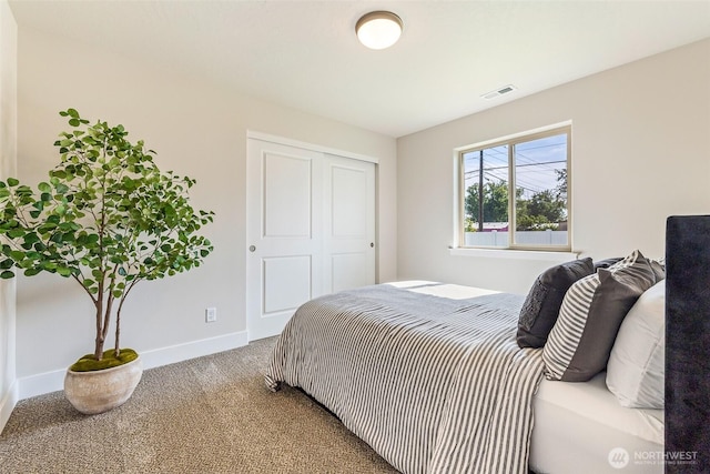 4208 W Sandy Ct, Moses Lake, WA 98837 - carpeted bedroom with baseboards and a closet
