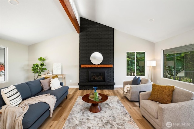 3020 Alpine Dr, Bellingham, WA 98226 - living area featuring a brick fireplace and light wood-style floors