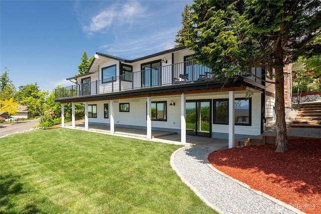 3020 Alpine Dr, Bellingham, WA 98226 - back of property with a balcony and a lawn