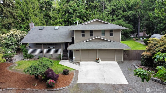 3521 170th Ave E, Lake Tapps, WA 98391 - view of front of property featuring a porch, driveway, a chimney, and a shingled roof