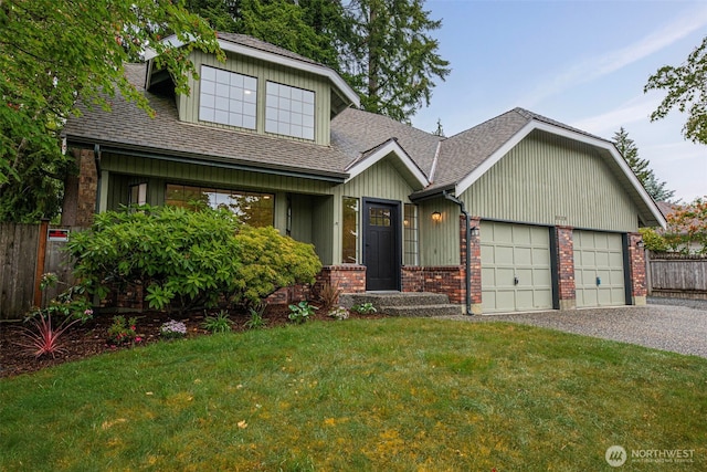 9828 33rd Dr SE, Everett, WA 98208 - view of front of property featuring roof with shingles, gravel driveway, a garage, and brick siding