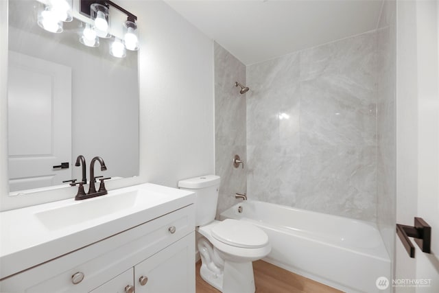 9828 33rd Dr SE, Everett, WA 98208 - bathroom featuring shower / bathtub combination, vanity, toilet, and wood finished floors