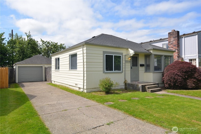 3159 Florida St, Longview, WA 98632 - bungalow-style house featuring a detached garage, an outdoor structure, roof with shingles, crawl space, and concrete driveway