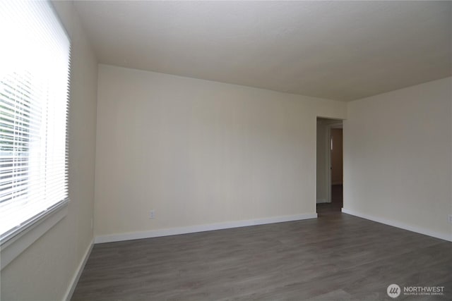3159 Florida St, Longview, WA 98632 - spare room with dark wood finished floors and baseboards