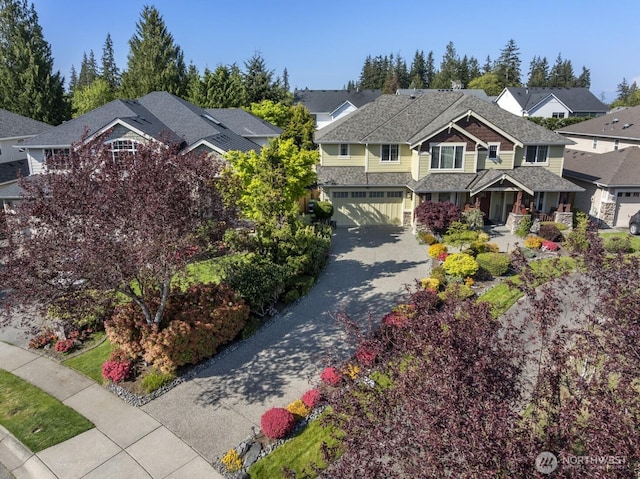 27 148th Pl SW, Lynnwood, WA 98087 - craftsman inspired home featuring driveway, a residential view, and an attached garage