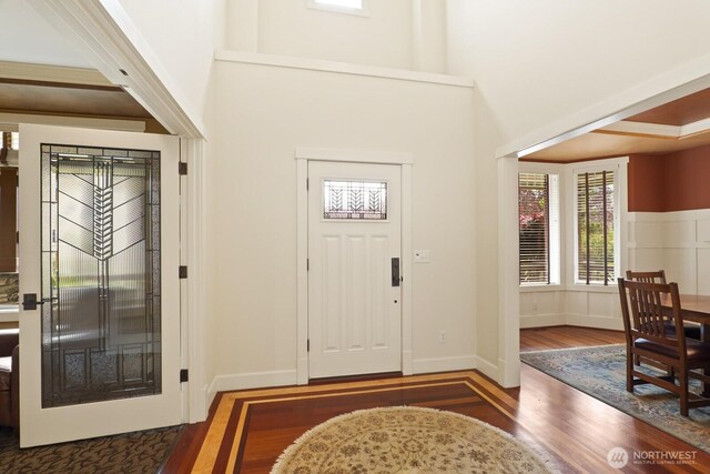 27 148th Pl SW, Lynnwood, WA 98087 - foyer with wood finished floors, a towering ceiling, and baseboards