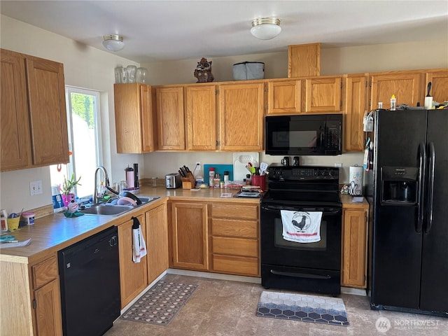 239 SE H St, Ephrata, WA 98823 - kitchen featuring black appliances, a sink, and light countertops