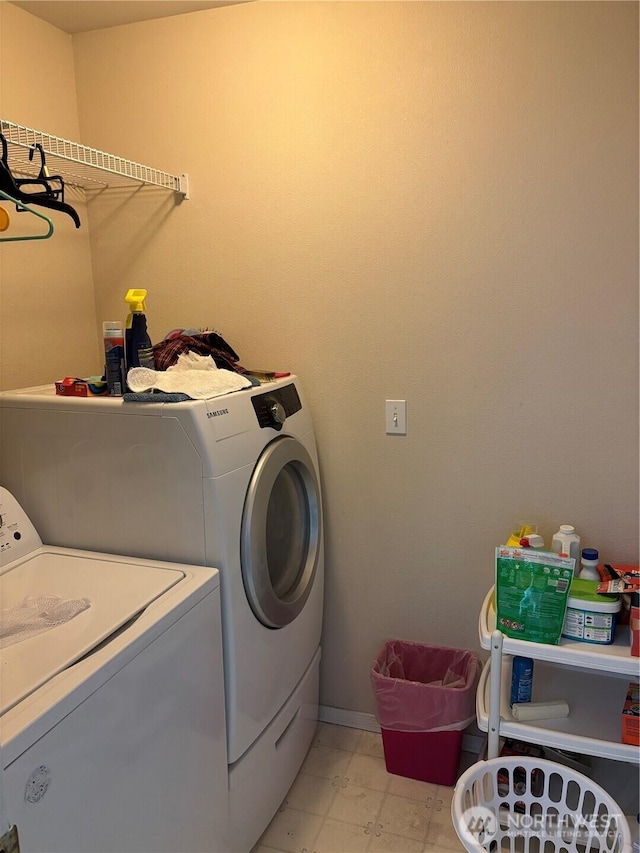 239 SE H St, Ephrata, WA 98823 - laundry room featuring independent washer and dryer and baseboards