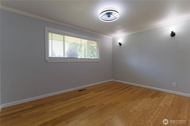 7519 221st Pl SW, Edmonds, WA 98026 - unfurnished room featuring light wood finished floors and ornamental molding