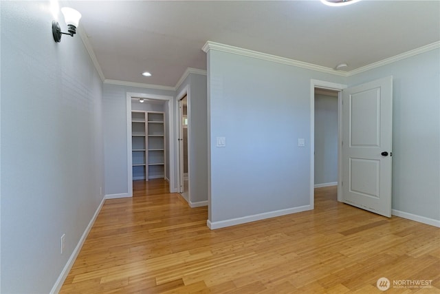 7519 221st Pl SW, Edmonds, WA 98026 - hallway with crown molding, light wood-type flooring, and recessed lighting