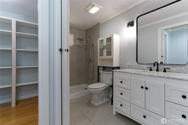 7519 221st Pl SW, Edmonds, WA 98026 - bathroom featuring a stall shower, vanity, crown molding, and a closet