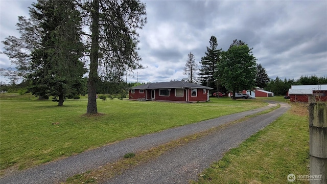 1296 US Highway 12, Chehalis, WA 98532 - ranch-style house with a front yard and a detached garage