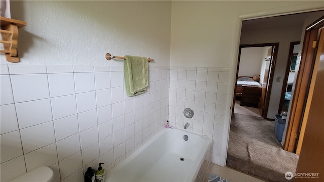 1296 US Highway 12, Chehalis, WA 98532 - ensuite bathroom featuring a bath and tile walls