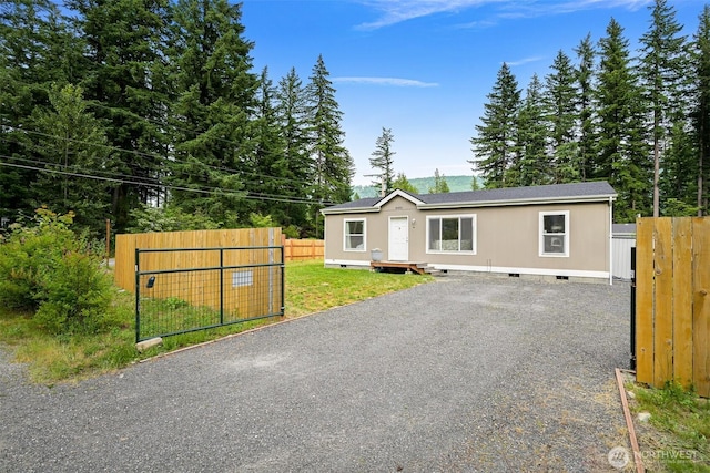 8450 Hazel Ct, Maple Falls, WA 98266 - view of front facade with crawl space and gravel driveway