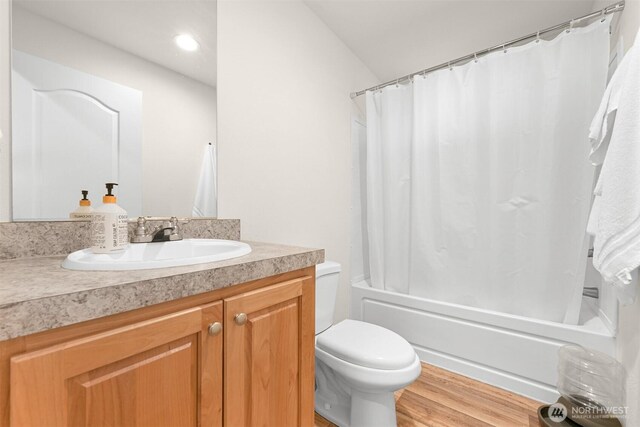 8450 Hazel Ct, Maple Falls, WA 98266 - full bathroom featuring vanity, shower / bath combination with curtain, wood finished floors, recessed lighting, and vaulted ceiling