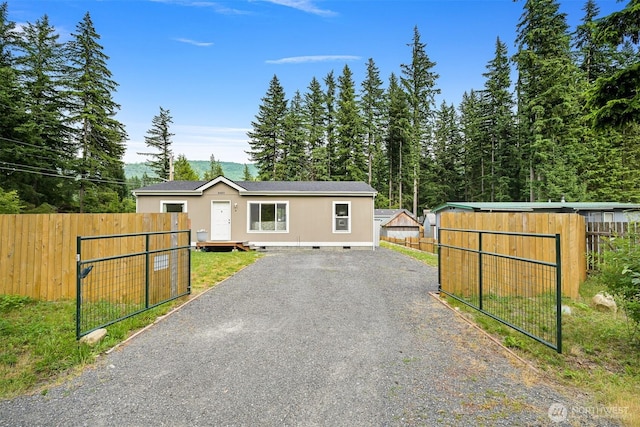 8450 Hazel Ct, Maple Falls, WA 98266 - view of front of home with crawl space and gravel driveway