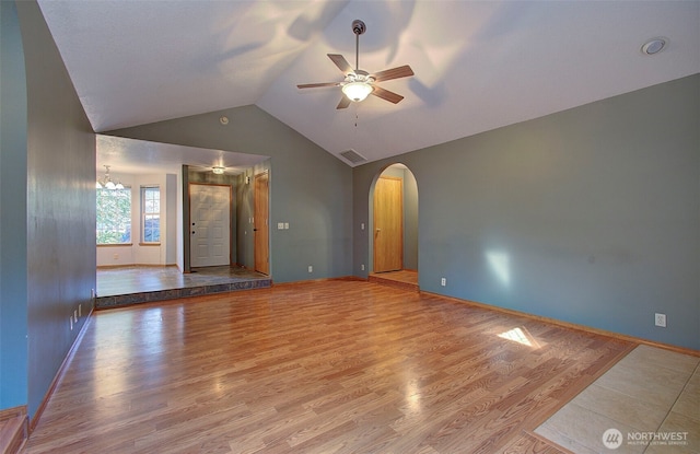 10010 NE 76th Cir, Vancouver, WA 98662 - unfurnished room featuring ceiling fan, vaulted ceiling, wood finished floors, and arched walkways
