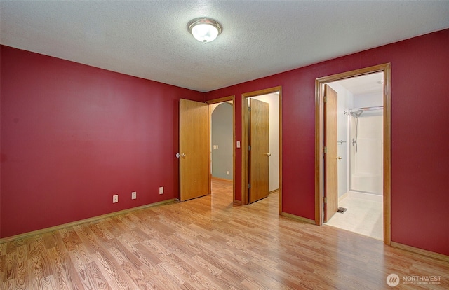 10010 NE 76th Cir, Vancouver, WA 98662 - empty room with light wood-type flooring and a textured ceiling