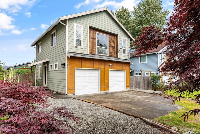 7005 Helweg Ln, Blaine, WA 98230 - view of home's exterior with an attached garage and driveway