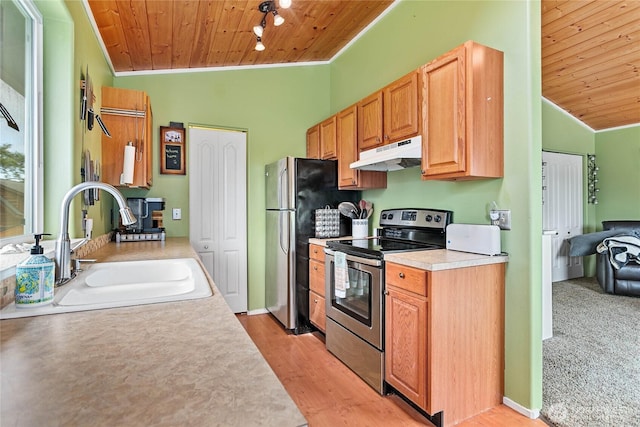 7005 Helweg Ln, Blaine, WA 98230 - kitchen featuring stainless steel appliances, wooden ceiling, under cabinet range hood, a sink, and lofted ceiling