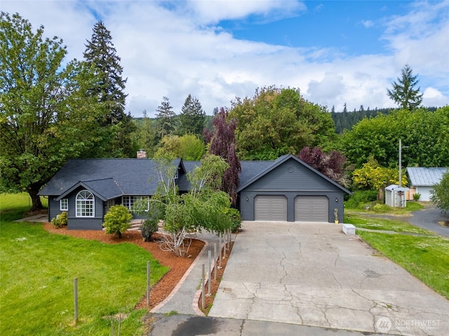 4680 State Route 6, Chehalis, WA 98532 - view of front of house with a front lawn, driveway, a garage, and a chimney