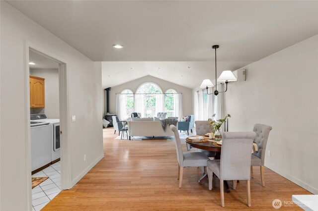 4680 State Route 6, Chehalis, WA 98532 - dining room featuring separate washer and dryer, lofted ceiling, light wood-type flooring, and recessed lighting