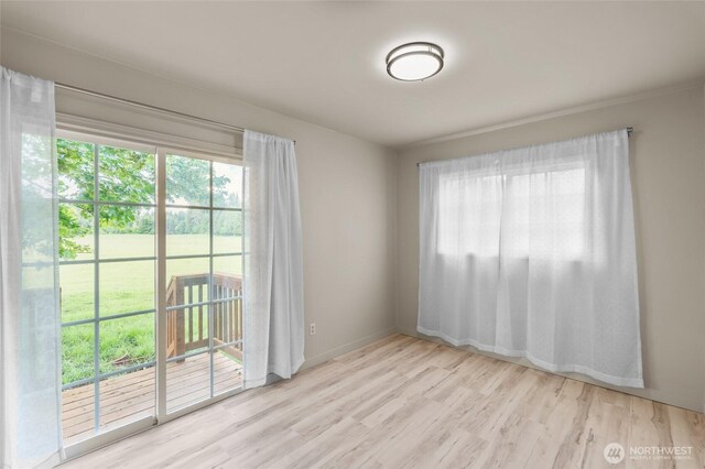 4680 State Route 6, Chehalis, WA 98532 - spare room with healthy amount of natural light, wood finished floors, and baseboards
