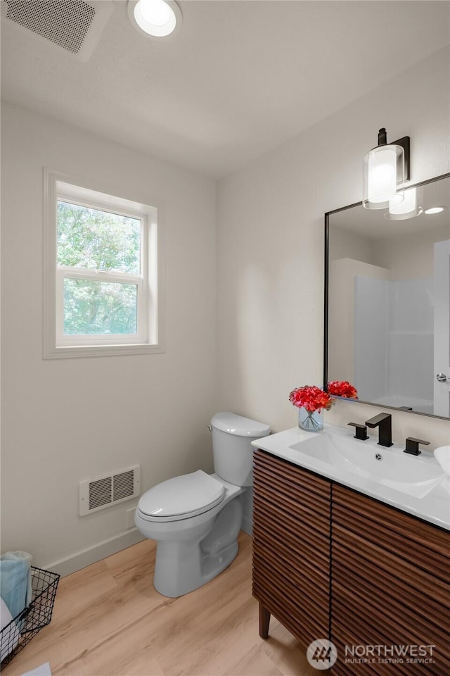 4680 State Route 6, Chehalis, WA 98532 - bathroom featuring vanity, wood finished floors, and toilet