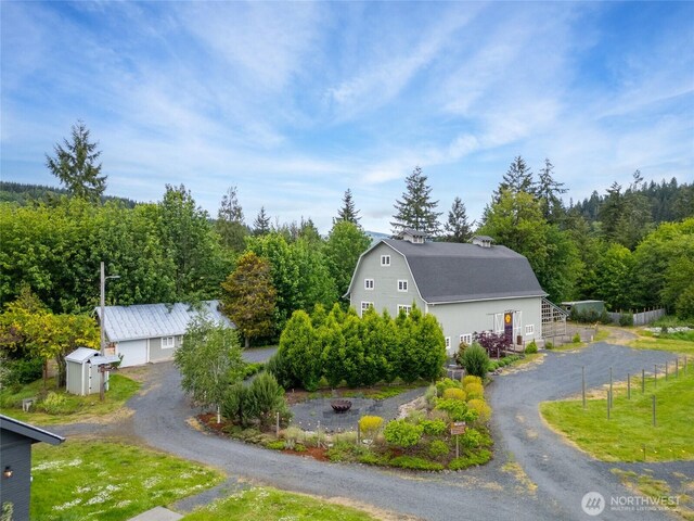 4680 State Route 6, Chehalis, WA 98532 - garage featuring a view of trees