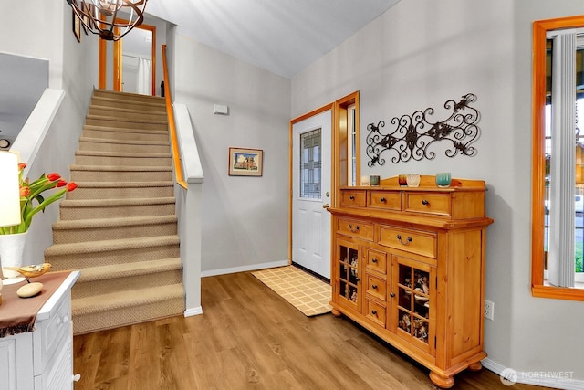 4421 166th Ave E, Lake Tapps, WA 98391 - entrance foyer with stairs, wood finished floors, baseboards, and a chandelier