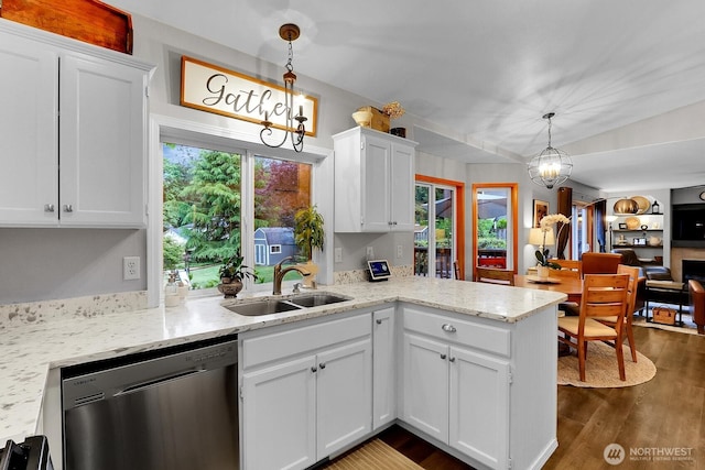 4421 166th Ave E, Lake Tapps, WA 98391 - kitchen featuring a sink, stainless steel dishwasher, white cabinetry, a peninsula, and dark wood-type flooring