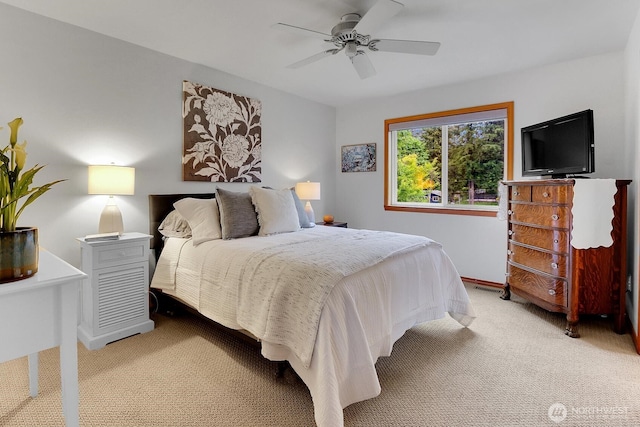 4421 166th Ave E, Lake Tapps, WA 98391 - bedroom featuring light colored carpet, a ceiling fan, and baseboards