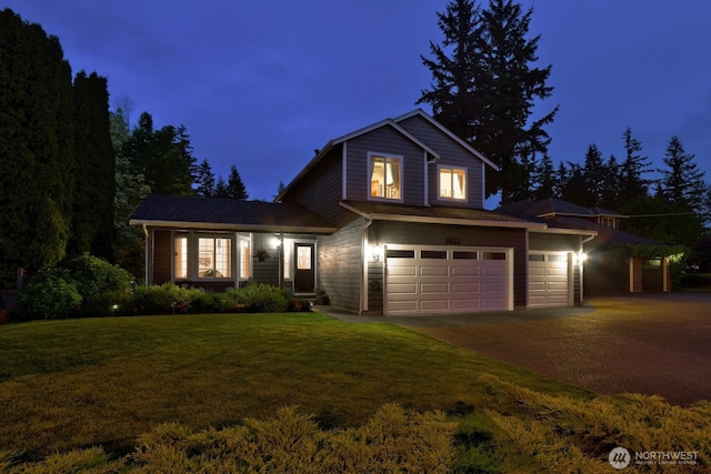 4421 166th Ave E, Lake Tapps, WA 98391 - traditional-style house with a yard, driveway, and a garage