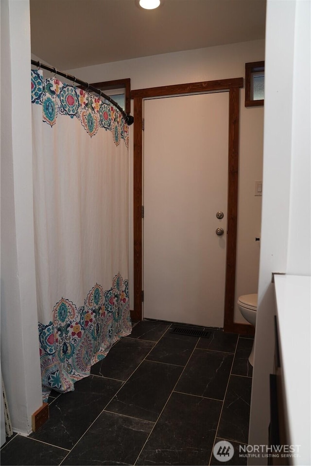 1360 Colchester Dr SE, Port Orchard, WA 98366 - bathroom with vanity, toilet, and a shower with shower curtain