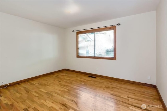 1360 Colchester Dr SE, Port Orchard, WA 98366 - unfurnished room with light wood-style flooring and baseboards