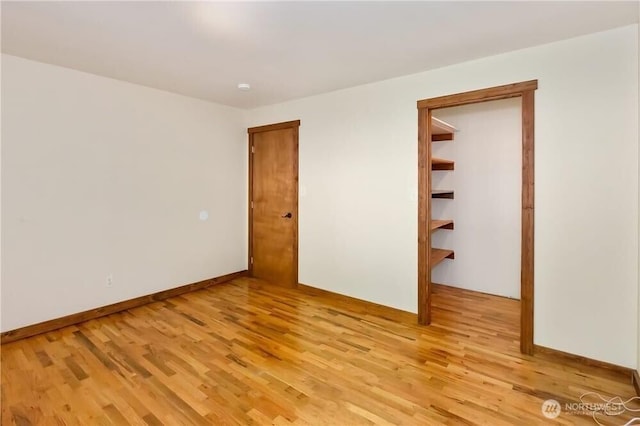 1360 Colchester Dr SE, Port Orchard, WA 98366 - unfurnished room with light wood-type flooring and baseboards