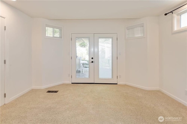 1360 Colchester Dr SE, Port Orchard, WA 98366 - carpeted entrance foyer featuring french doors and baseboards