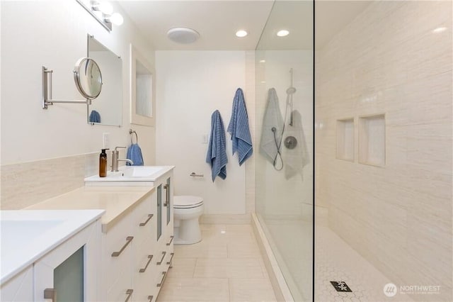 1360 Colchester Dr SE, Port Orchard, WA 98366 - full bathroom featuring vanity, walk in shower, toilet, tile patterned floors, and recessed lighting