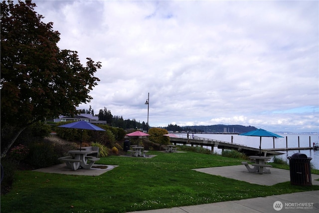 1360 Colchester Dr SE, Port Orchard, WA 98366 - view of green lawn with a water view and a patio