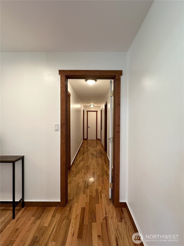 1360 Colchester Dr SE, Port Orchard, WA 98366 - hall featuring wood finished floors and baseboards
