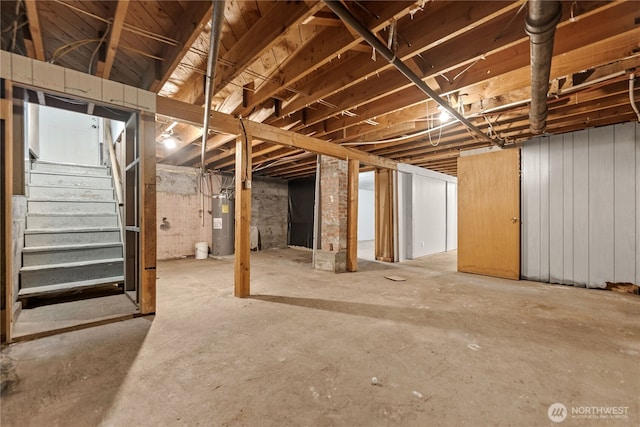 318 Lombard St, Twisp, WA 98856 - unfinished below grade area with electric water heater and stairway