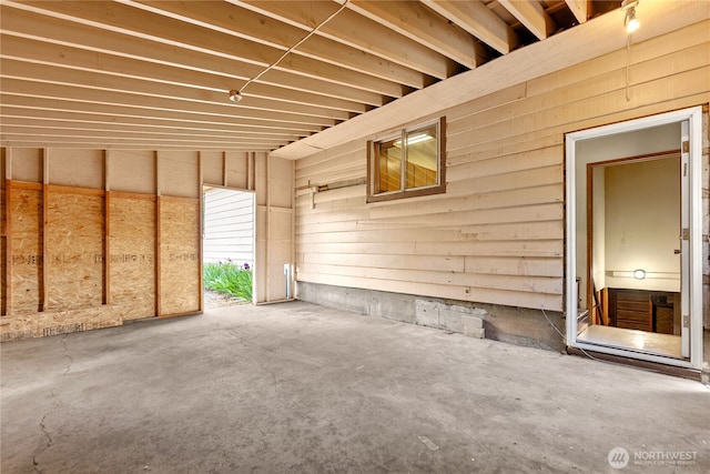 318 Lombard St, Twisp, WA 98856 - miscellaneous room with unfinished concrete floors