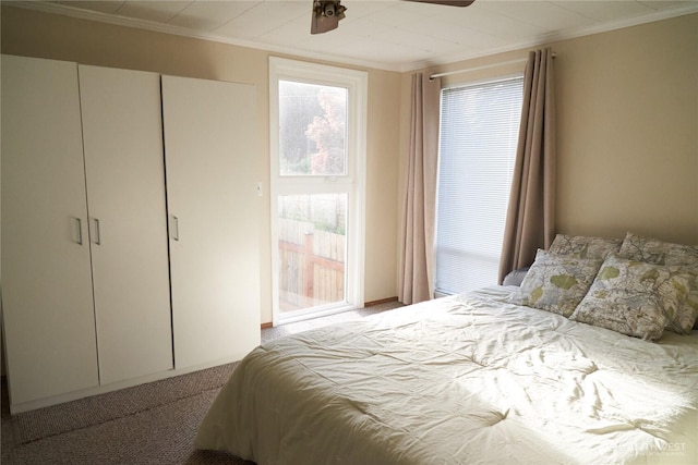11433 12th Ave SW, Burien, WA 98146 - bedroom with carpet flooring, crown molding, and ceiling fan