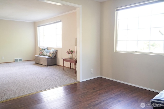 11433 12th Ave SW, Burien, WA 98146 - living area with crown molding, wood finished floors, and baseboards