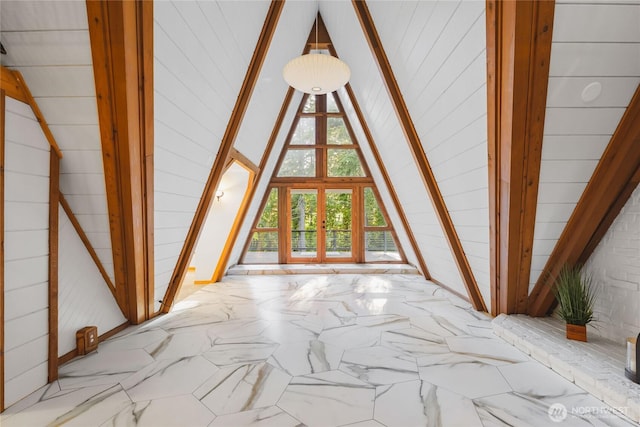 5617 236th Ave NE, Redmond, WA 98053 - additional living space with marble finish flooring, lofted ceiling, and wooden walls