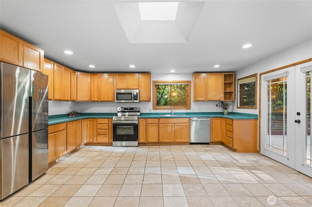 5617 236th Ave NE, Redmond, WA 98053 - kitchen featuring stainless steel appliances, open shelves, light tile patterned floors, recessed lighting, and french doors