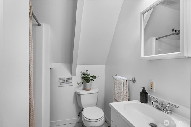 5617 236th Ave NE, Redmond, WA 98053 - bathroom with toilet, vanity, and baseboards