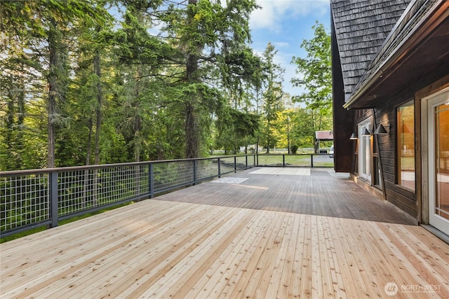 5617 236th Ave NE, Redmond, WA 98053 - wooden terrace with view of wooded area